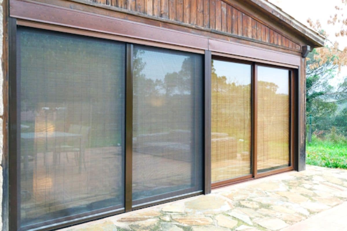 Sliding insect screen for door